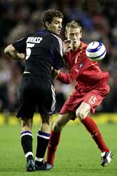 Met Anderlecht in duel met Peter Crouch van Liverpool.